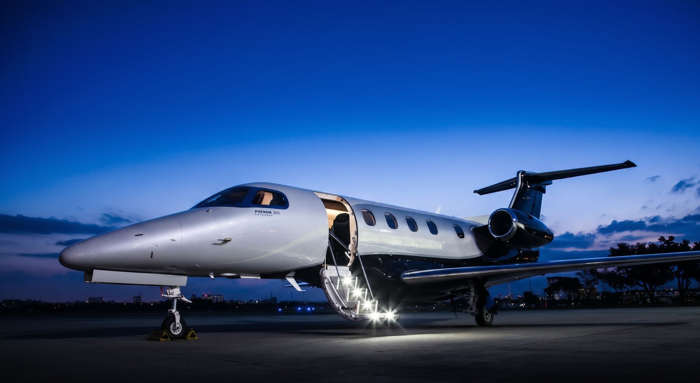 Aircraft on the tarmac before departure, ground operations in progress.